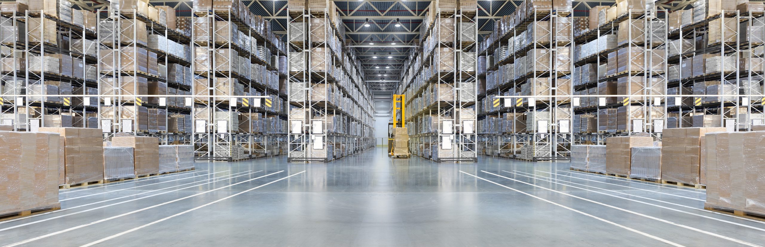 Huge distribution warehouse with high shelves