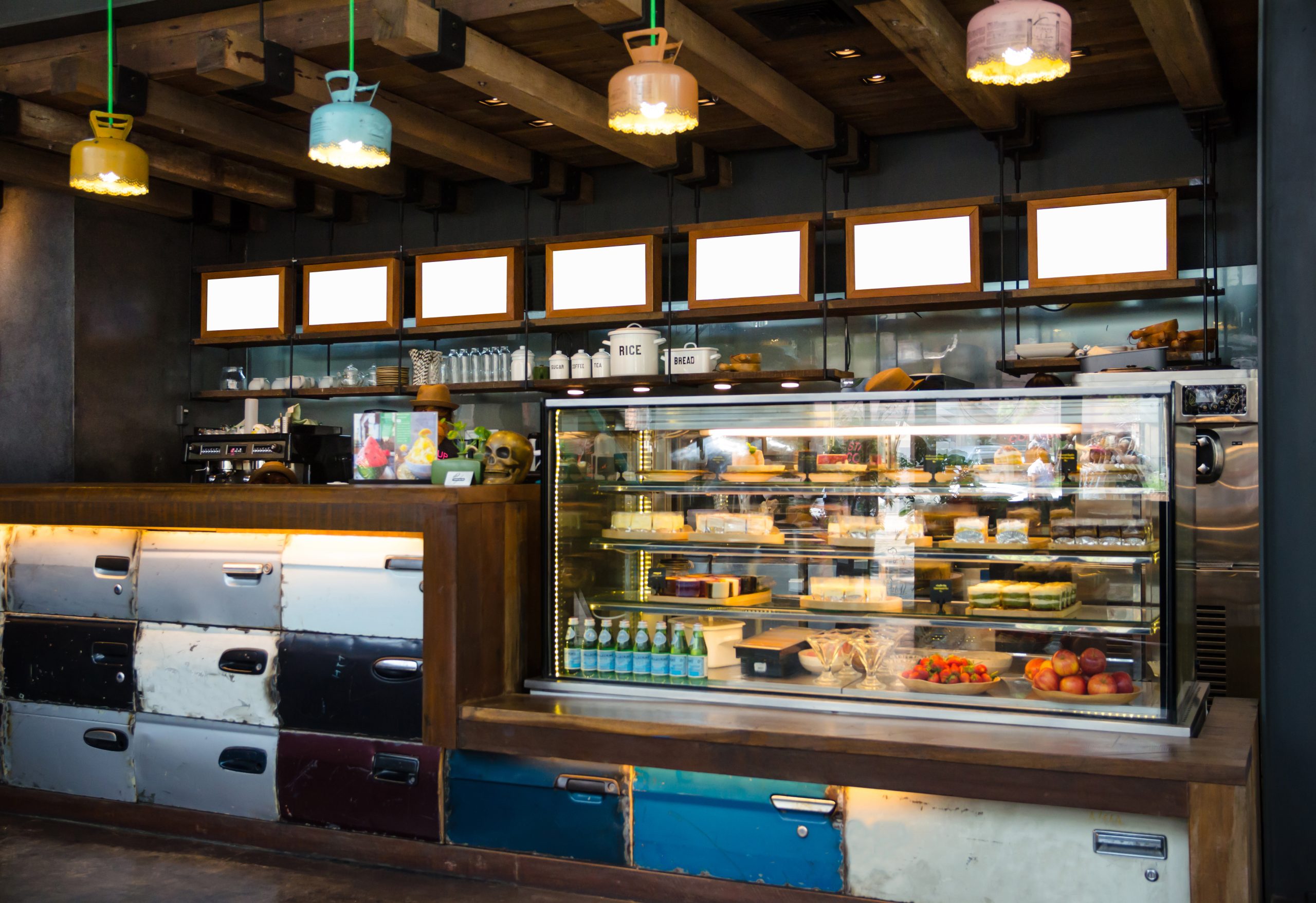 wooden coffee counter with refrigerator