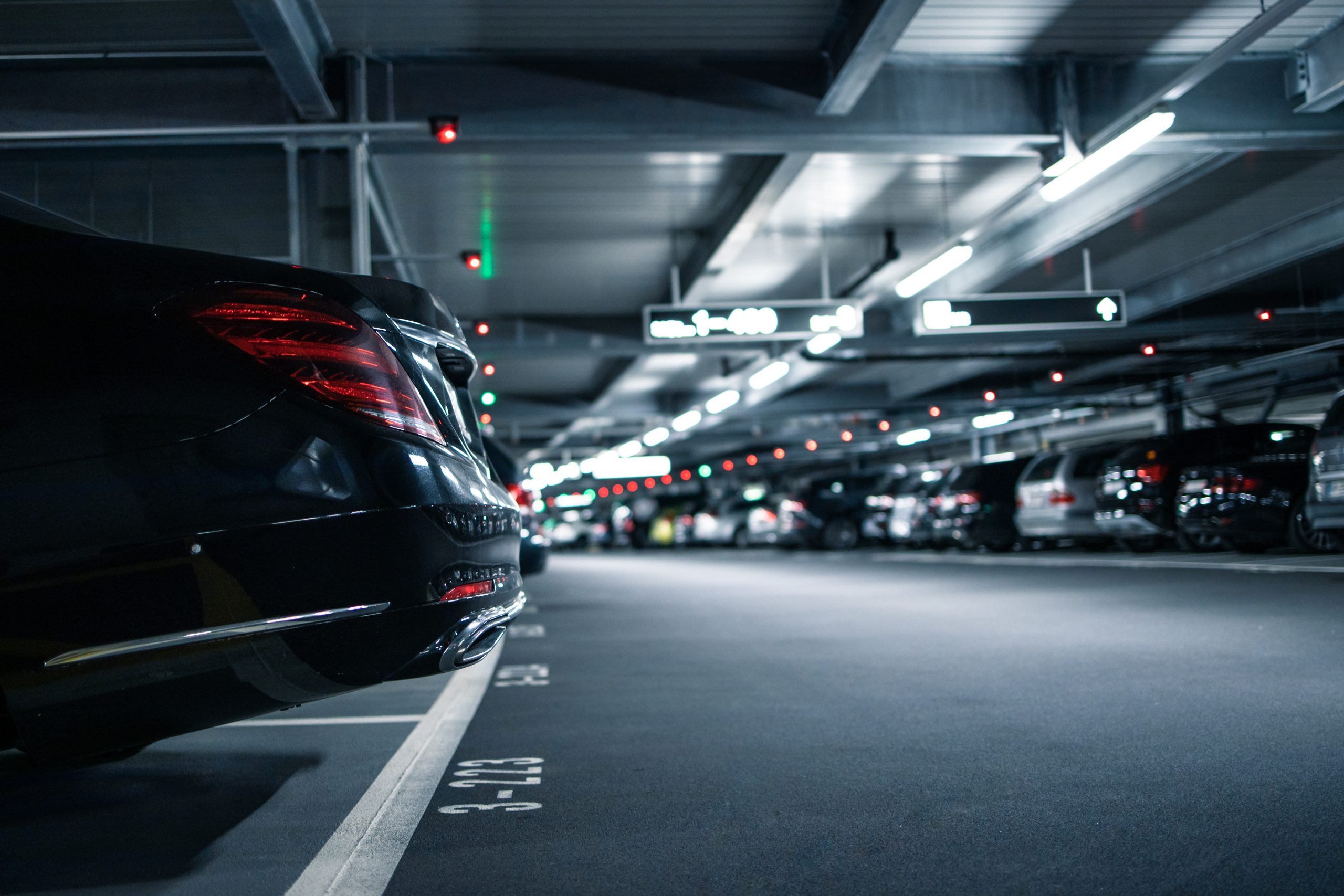 Underground garage or modern car parking with lots of vehicles