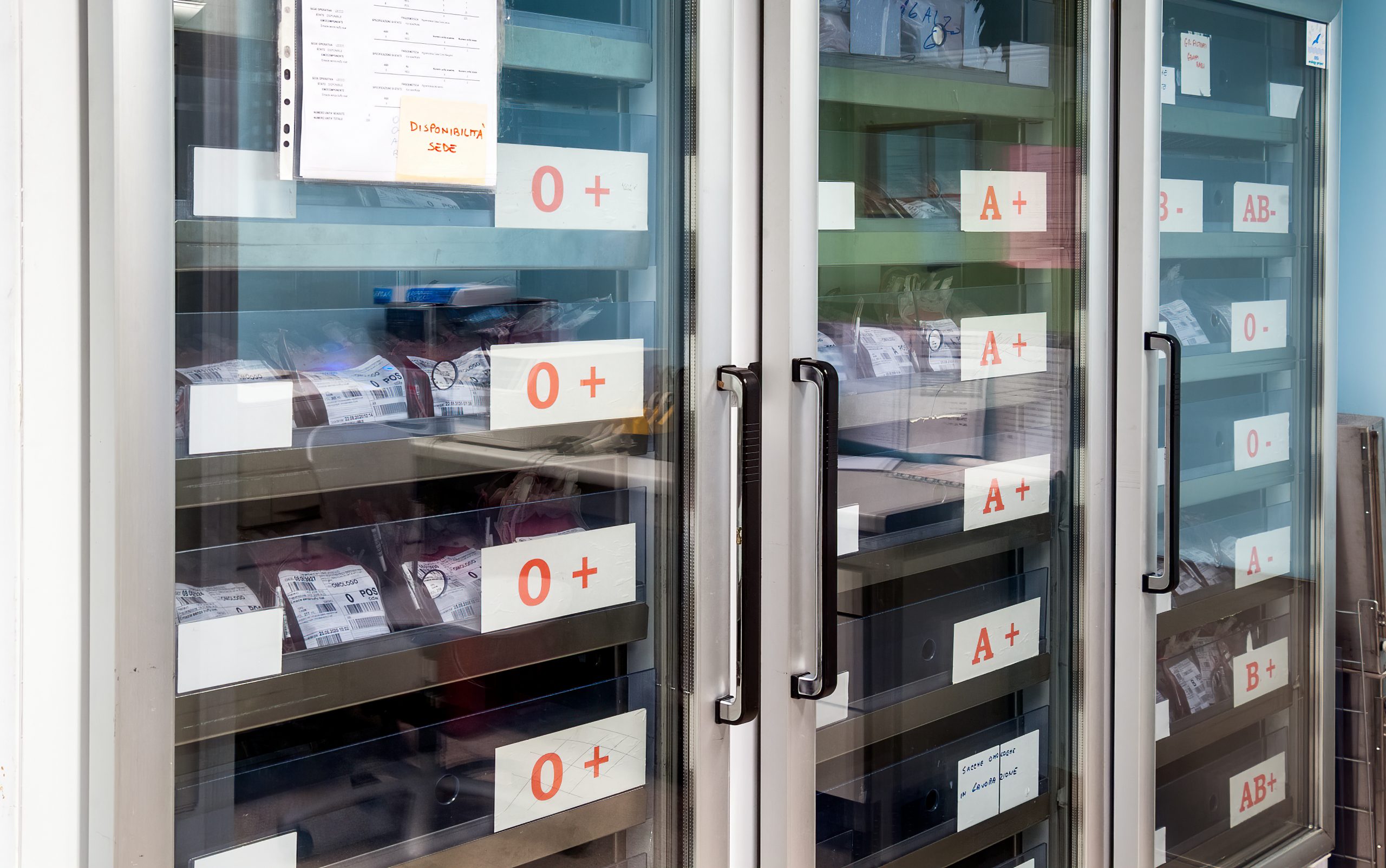 Refrigerated cabinet with stocks of blood bags in the hospital
