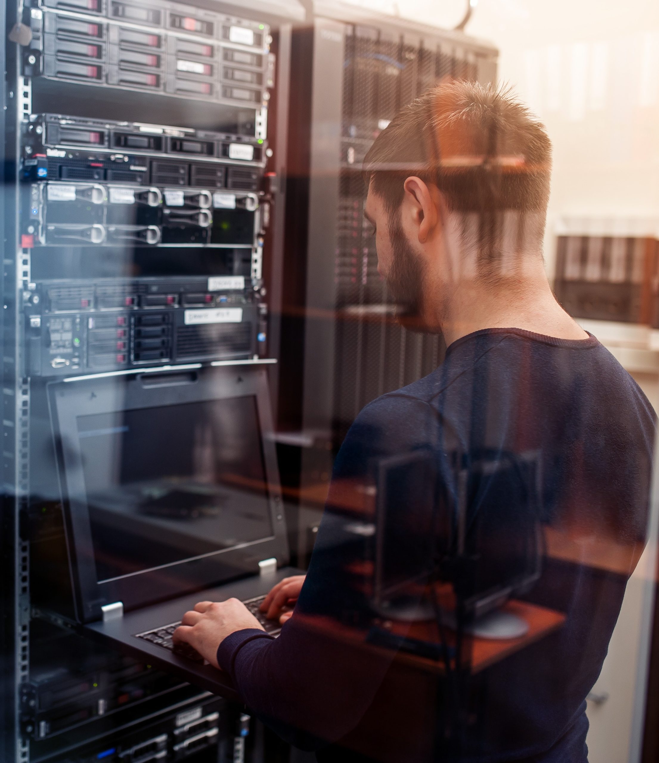 network engineer working in server room